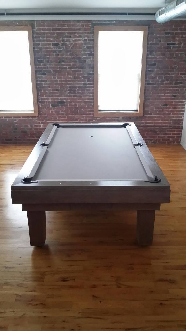 Custom, one of a kind pool table designed by Thomas O'Brien, founder of Aero Studios. The design for this table was inspired by one of the masters of modern minimalism, Jean-Michel Frank. The finish is "cerused oak" stain and wax finish.