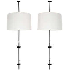 Large pair of early Tommi Parzinger wall sconces