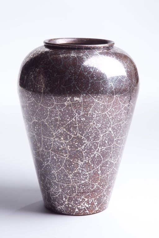 Patinated brass vase with silver wash, designed by Jay Spectre circa late 1970's.

We offer free delivery within the Long Island / Greater NYC,
northern New Jersey, Connecticut and Massachusetts areas on most of our items. Please inquire for further