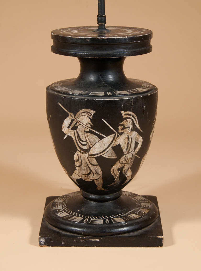 Mid-20th century lamp with painted classical figures in white on a  bLack ground.

FREE SHIPPING WITHIN THE US.
