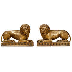 Pair of Carved and Giltwood Lions