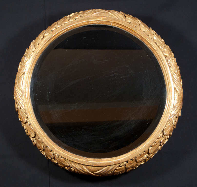 A most boldly carved early 19th century gilt-wood circular mirror.  The frame with great depth and splendid carving.

On view at our space on the 10th Floor, 
New York Design Center, 
200 Lexington Avenue at 33rd Street.

Ask us about our