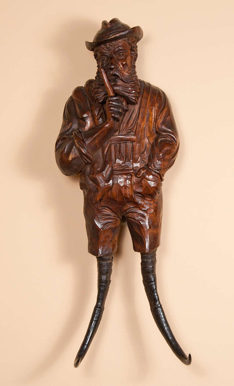 Swiss "Black Forest" carving of a Whip Hook