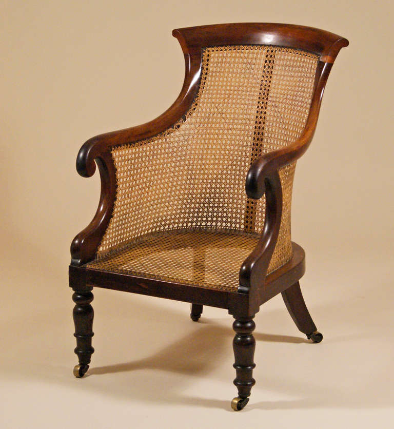 This barrel-back chair is one of the few most comfortable antique chairs you can find. It dates to the English Regency period, 

Circa 1810-1820.

With loose cushion seat.

On view at our space on the 10th Floor, 
New York Design Center,