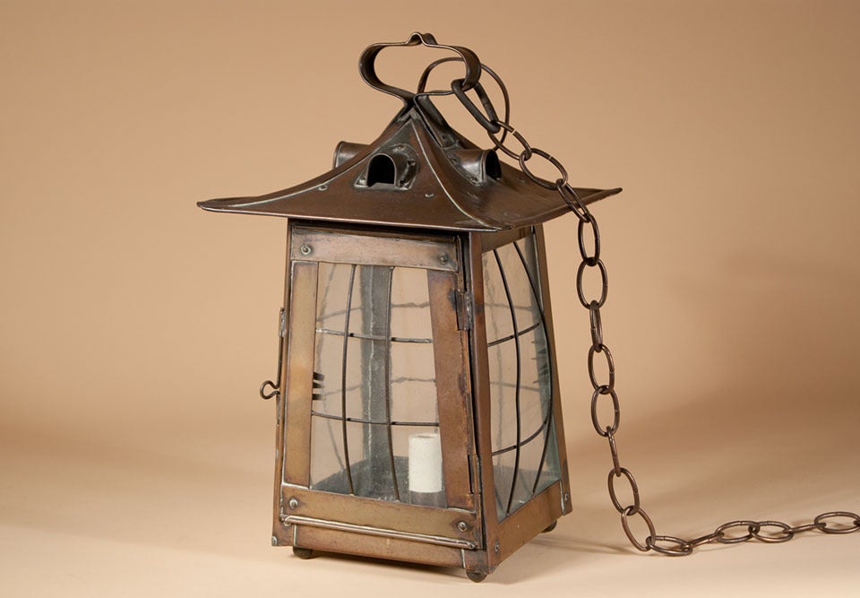 An Arts & Crafts period copper lantern:  The tapering body with grillwork and glazed panels with a pagoda-form top. Now wired for electricity.

Ask us about our reduced-rate shipping plans.  
Sometimes we are even able to offer Free Shipping,