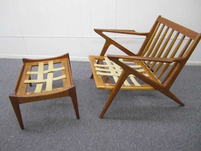 Fabulous Poul Jensen z-arm teak lounge chair plus matching ottoman.  This chair has a lovely vintage teak frame with a gorgeous time worn patina only father time can give.  You will love to sit back, relax and put your feet up on the matching