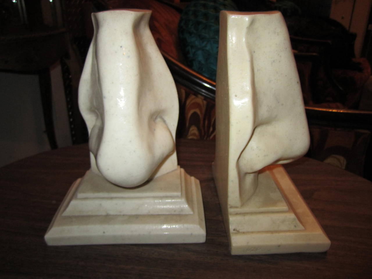 Unusual pair of oversized Italian Marble composition bookends. Outrageous and fun, a must have for the person who already has everything. I am sure they don't have a pair of these!