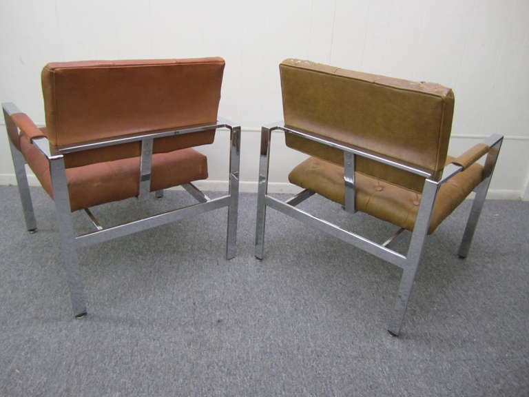 Fantastic pair of signed Milo Baughman executive lounge chairs.   These are perfect chairs to set on the other side of an executive's or lawyer's desk.  They are in need of reupholstering but the chrome looks great and all of the adjustable foot