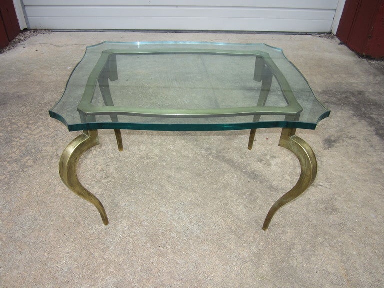 AMAZING AND HEAVY SOLID ITALIAN BRASS CABRIOLE LEG SIDE TABLE.  WOW! IS ALL I CAN SAY WHEN I TALK ABOUT THIS PIECE.  THE LEGS ARE SOOO SEXY WITH A SLIGHT HARD EDGE.  THIS PIECE RETAINS IT'S VINTAGE PATINA WHICH I FIND VERY ATTRACTIVE BUT CAN BE