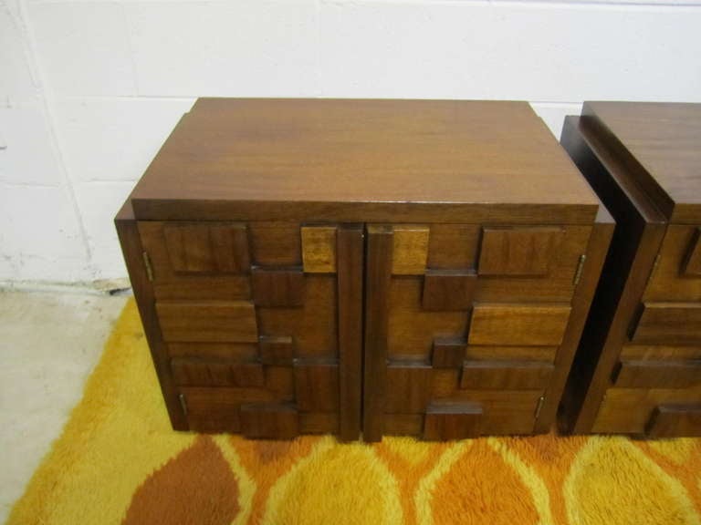 Handsome pair of Paul Evans inspired chunky walnut mosaic night stands made by Lane.  They are well constructed and in very nice condition.The doors open to reveal a nice open space with one fixed shelf.  I do have more pieces from this same