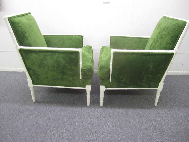 Lovely pair of faux bamboo lounge chairs in the regency modern style.  The chairs have been recently reupholstered in a kelly green chenille and look quite nice.  They are extremely comfortable and very stylish you will love them!