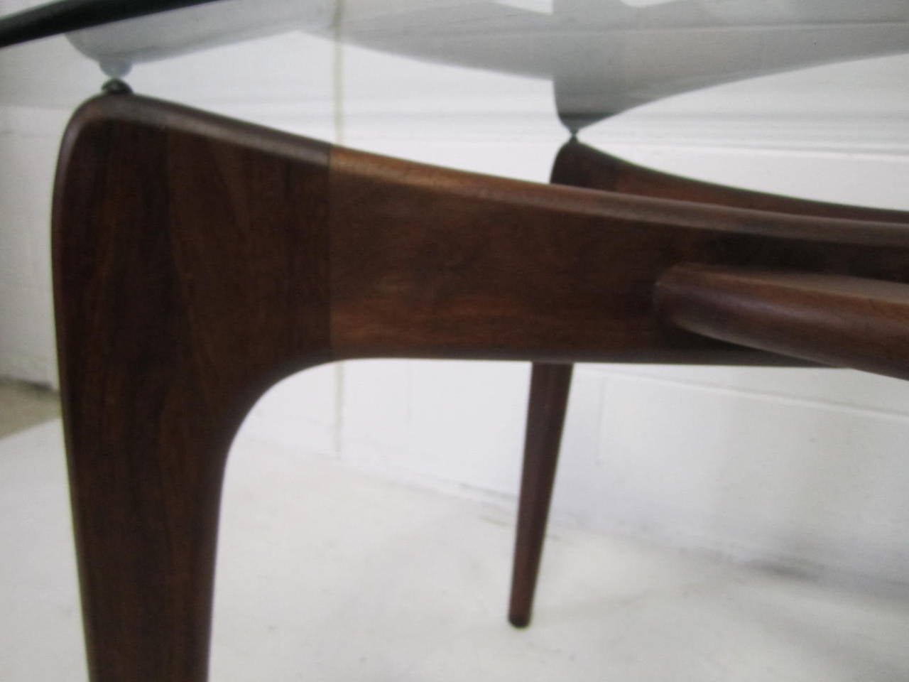 Stunning Adrian Pearsall large sculptural walnut dining table. A Mid-Century Modern dining table designed by Adrian Pearsall and made by Craft Associates. This wonderful piece is in excellent vintage condition, well taken care of for over 50+ years.