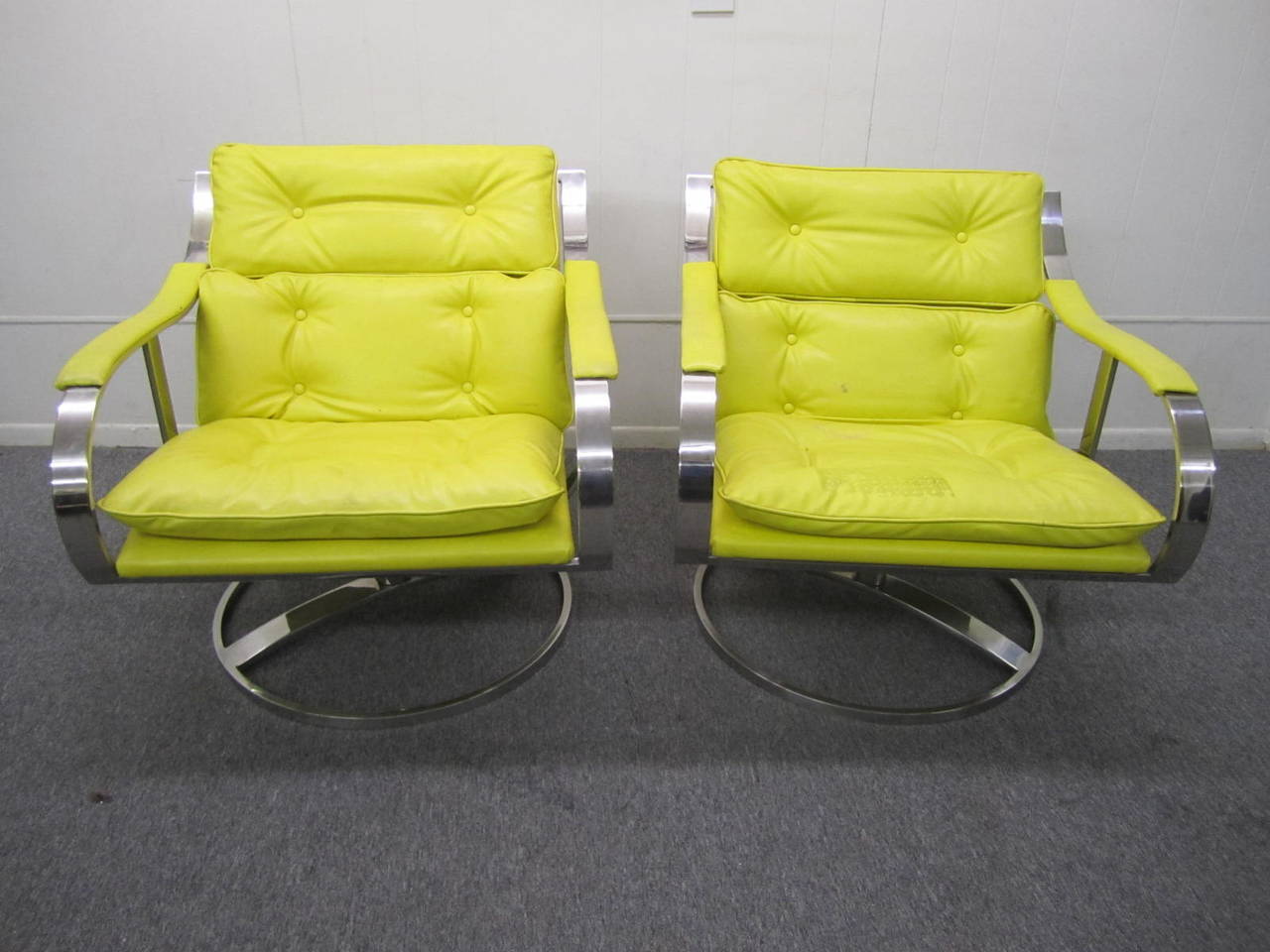 Series 455 chairs by Gardner Leaver for Steelcase. Nickel-plated steel with Faux yellow leather on swivel base. The upholstery does need to be replaced but that's what you designers are looking for anyway-right?  The super heavy chrome bases look