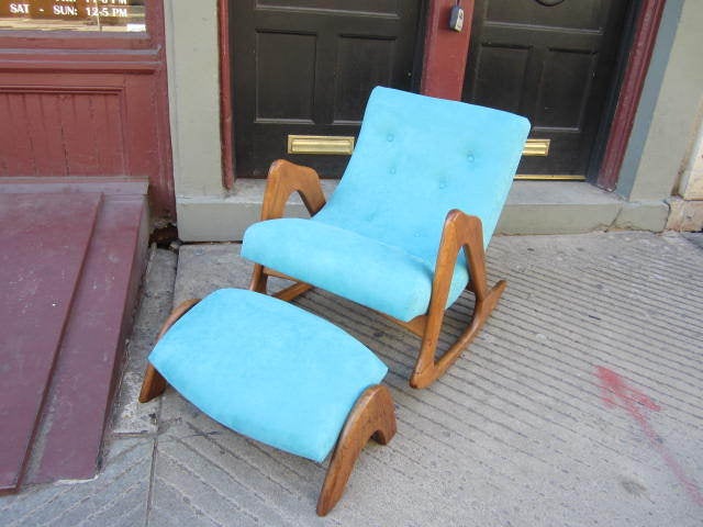 Gorgeous Adrian Pearsall rocker with new turquoise ultra suede fabric. The ottoman has been sold so only the rocker remains. The solid walnut frame is tight and sturdy-looks more like a work of art than a rocker. This piece is sure to please and