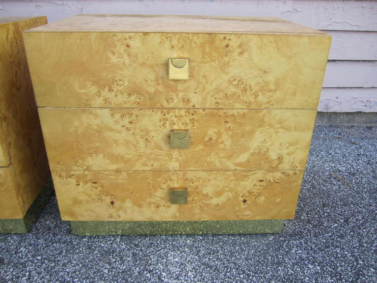 Stunning pair of Milo Baughman style olivewood night stands made by Founders.  Wonderful light olivewood with brass hardware.  I do have the matching credenza,tall dresser and headboard if interested in a set.