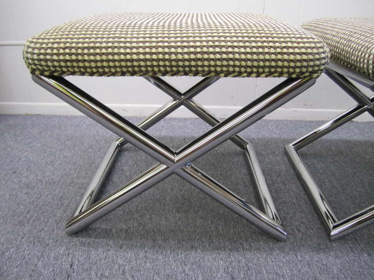 Outstanding pair of Milo Baughman chrome X base stools ottomans.  Heavy thick round chrome tubes are meticulously crafted and mirrored finish.  This pair retains it's original super nubby woven upholstery which still looks great.  Because of their