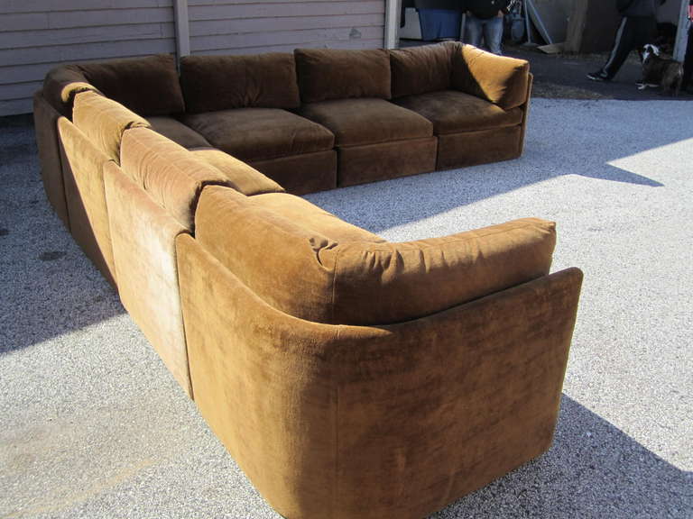 This amazing signed Milo Baughman sofa is in fabulous vintage condition.  Upholstered in it original chocolate high end velvet and still looks fabulous.  I especially love the curved end pieces-well designed and oh sooo comfortable.