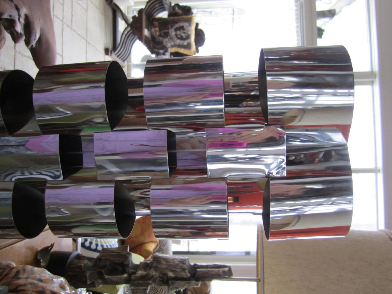 C. Jere floor lamp in skyscraper form with chrome interlocking clover shaped pieces. This lamp is signed and dated 1971 and is in excellent condition with only minor patina or scuffs to chrome. Chrome pieces have all been painstakingly cleaned and