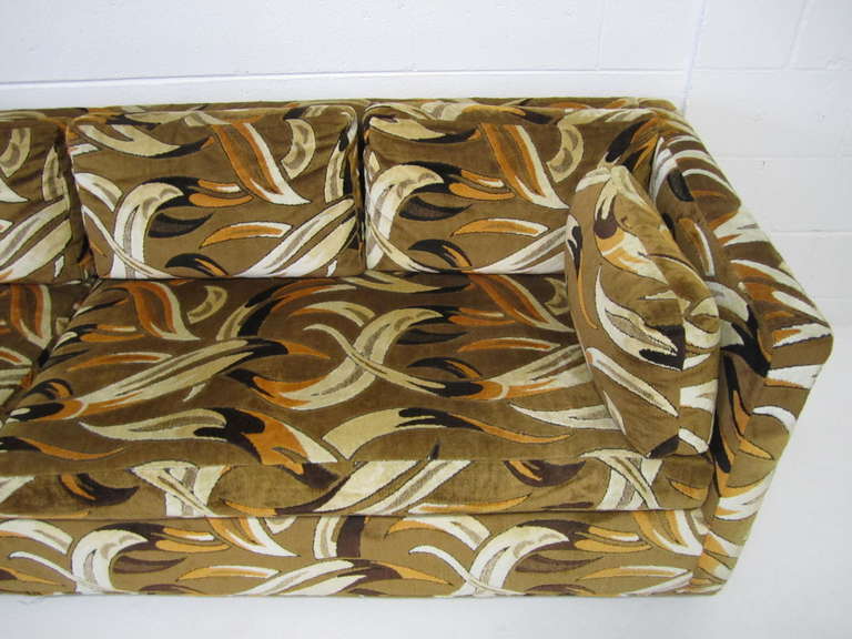 Wonderful Milo Baughman style 4 seater sofa with wild Jack Lenor Larsen cut velvet fabric.  The fabric is actually fabulous and in wonderful condition.  And talk about comfort this piece feels great to sit or lay on.  I love the extra long, low