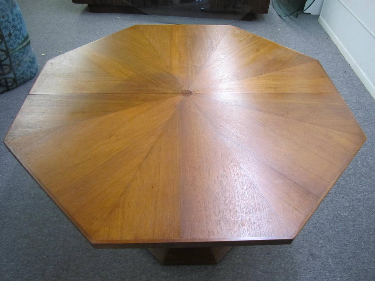Gorgeous Mid century modern cathedral style Probber inspired pedestal dining table with 3 leaves. The top is amazing with circle inlays and dynamite octagon shape. The base has a Harvey Probber inspired pedestal.   I have the original set of  caned