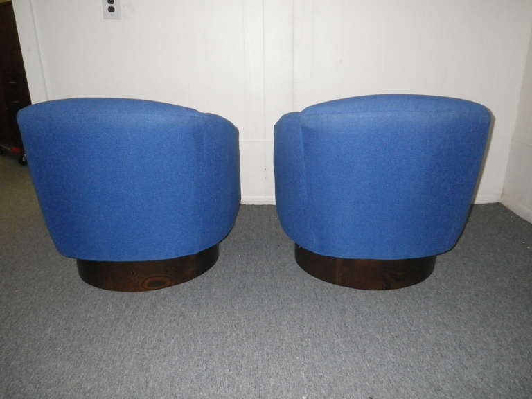 GORGEOUS PAIR OF HARVEY PROBBER STYLE SWIVEL BARREL BACK LOUNGE CHAIRS.  THESE CHAIRS RETAIN THEIR ORIGINAL VINTAGE HEAVY BLUE WOVEN UPHOLSTERY IN NICE CONDITION.  THE BASES ARE EXTRA TALL AT 6