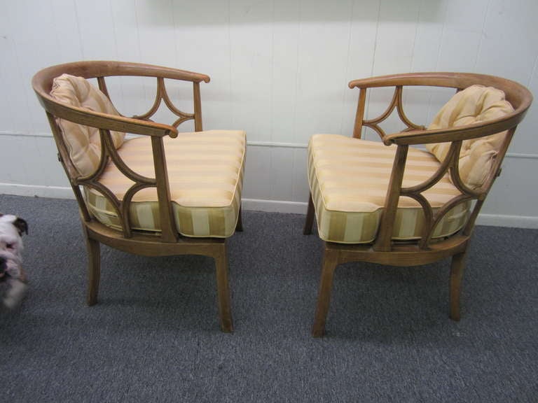 Wonderful pair of Billy Haines fruitwood barrel back chairs. This pair is meant to be seen from all angles-looks as good from the back as they do from the front. They are in fantastic vintage condition and are sure to be a treasured addition to your