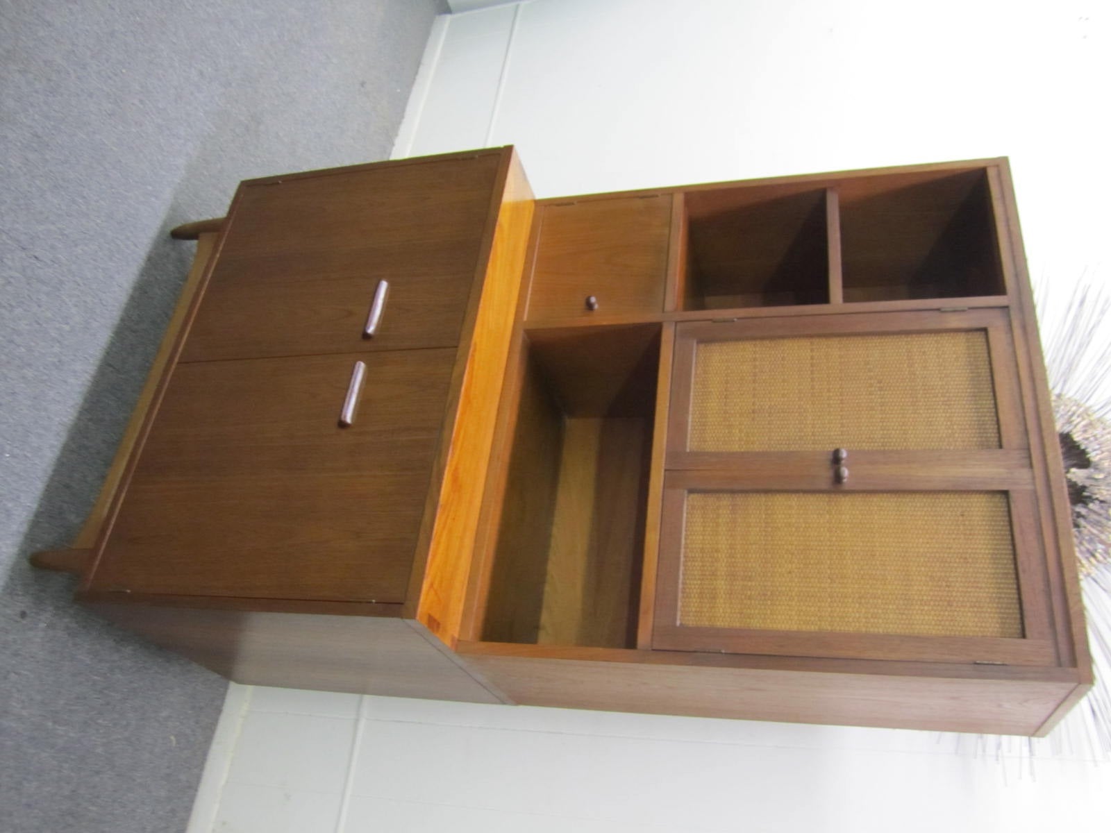 Rare 2 piece cabinet with separate hutch- part of the Acclaim series for Lane.  Great storage options for in the kitchen or any living space with tons of cubbies and one drawer.  We especially like the caned front doors on the removable hutch.  Put