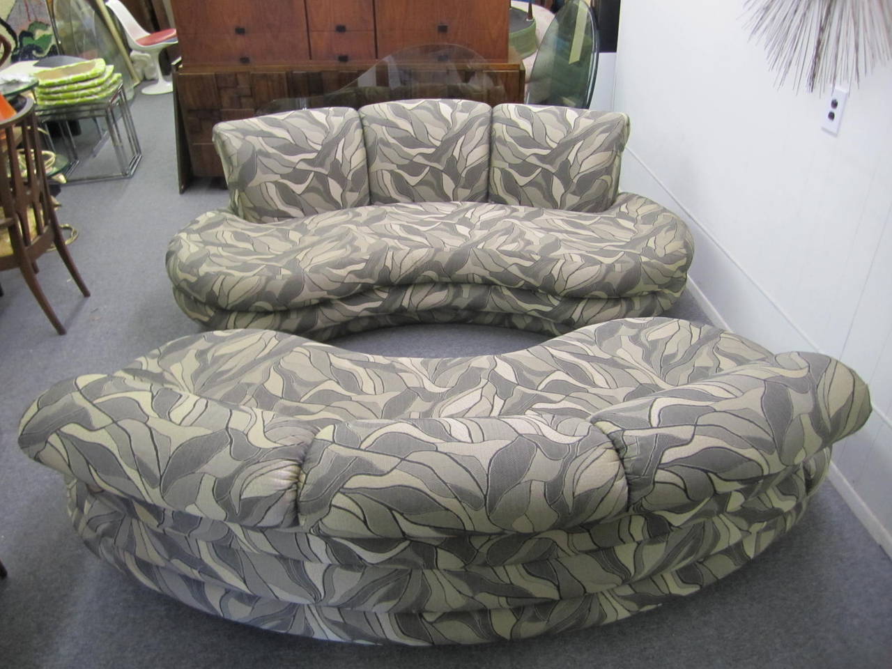 Fabulous pair of kidney-shaped cloud sofas Mid-Century by Adrian Pearsall for Comfort Designs. These sofas are gorgeous just as they are with a super organic Pucci style print done in earth tones. Almost an oxymoron with a Pucci print done in earth