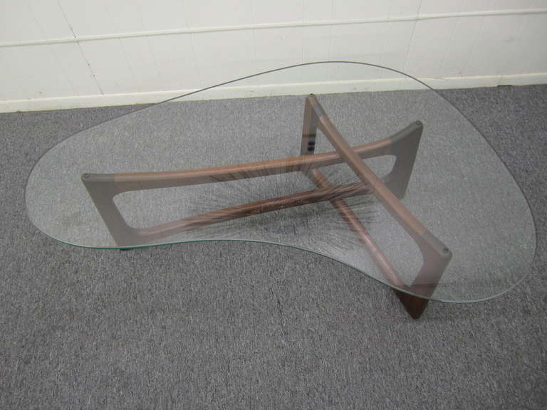 Wonderful and iconic Adrian Pearsall sculptural walnut coffee table.  This is a fine example of this amazingly designed table.  The fine crafted walnut base has a oil rubbed finish that is original. I love the original finish,the wood seems a bit
