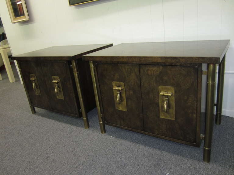 OUTSTANDING PAIR OF BURLED WOOD MASTERCRAFT NIGHT STANDS.Stylized thick bamboo legs give the illusion of the cabinet floating. Each door has heavy solid brass pulls-they open to reveal a nice open space with a singular shelf . All beautifully