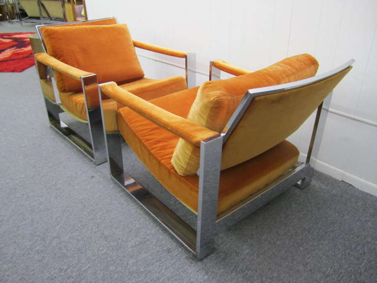 Spectacular and rare pair of Milo Baughman super chunky chrome lounge chairs. Wow! Is what you will say when you see this wonderful pair of chrome loungers. The super wide chromed steel flat bars give these a extra punch of excitement. They retain