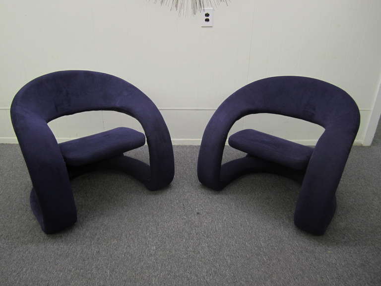 Gorgeous pair of unusual ribbon chairs with fabulous purple ultra suede.  This wonderful pair is in excellent vintage condition with little to no wear. Extremely comfortable with a sculptural quality-you will love the style and craftsmanship.