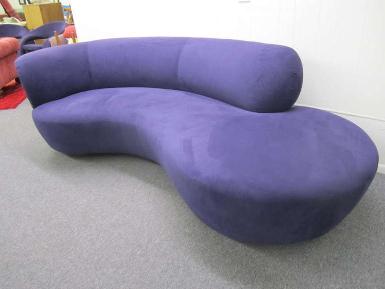 Asymmetric shaped pair of sofas by Vladimir Kagan for Directional, circa 1970s.
Flowing, curvaceous lines and depth offer decadent comfort and visual exuberance as only a Vladimir  Kagan design can.  The two sofas are exactly the same but mirror