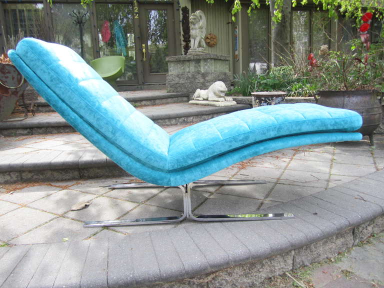 Totally restored chrome lounge chair. This piece has been lovingly restored to showroom condition. The upholstery is a high end lightly textured velvet in an amazing shade of turquoise. The heavy solid chromed steel flatbar base has also been