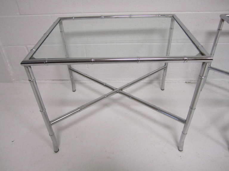 Lovely pair of chrome faux bamboo and glass side tables.