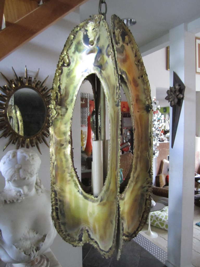 Pair of Brass Pierced Torch Cut Brutalist Pendant Lights