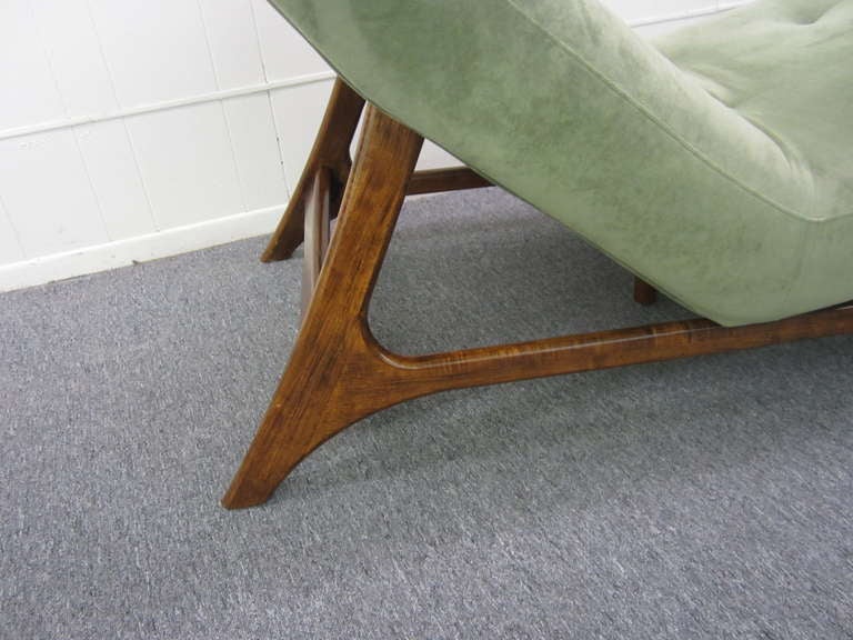 LOVELY ADRIAN PEARSALL STYLE CHAISE LONGUE CHAIR.  THE UPHOLSTERY IS  A SAGE MOSS GREEN ULTRASUEDE AND IS IN VERY NICE CONDITION.  THE SOLID WALNUT FRAME LOOKS GREAT AND IS TIGHT AND STURDY-WELL CRAFTED.  THIS SEEMS TO BE A NEWER VERSION OF A