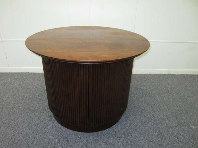 Very nice Lane ribbed side table with hidden doors that reveal tons of storage.  You will be amazed at the quality and craftsmanship of this Lane piece.  The base is made of carved solid wood pieces-see the photos.  The top has it original finish