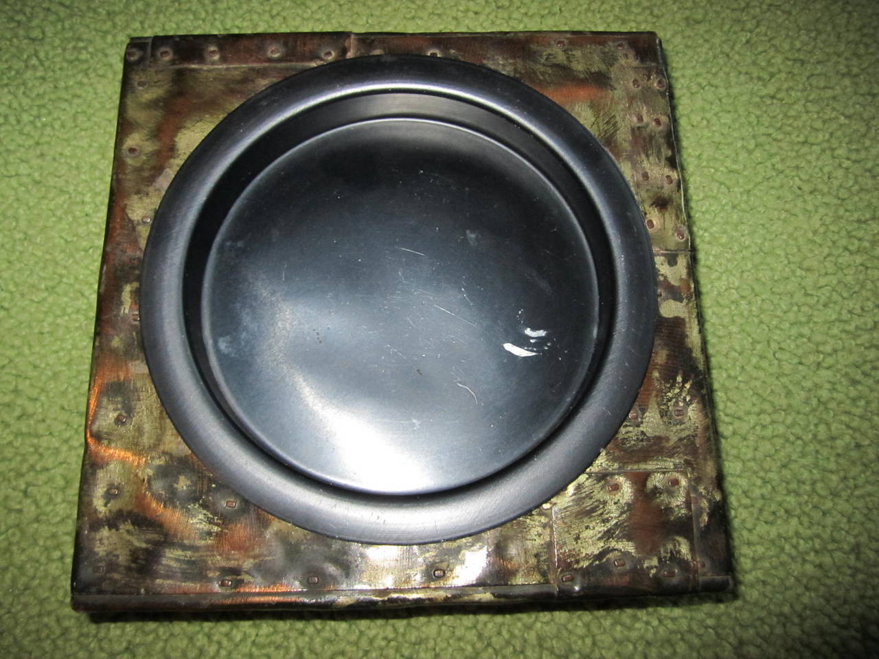 Brutalist 1960s Paul Evans patchwork metal ashtray. The black metal dish is removable for easy cleaning. Great for the Mid-Century collector who has everything!