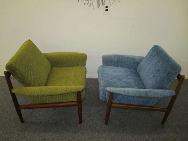 Outstanding pair of Greta Jalk teak lounge chairs.  The retain their original textured velvet in nice vintage condition.  I know you designers are looking for chairs to reupholster and here is a great pair.  Very useable as is but would be