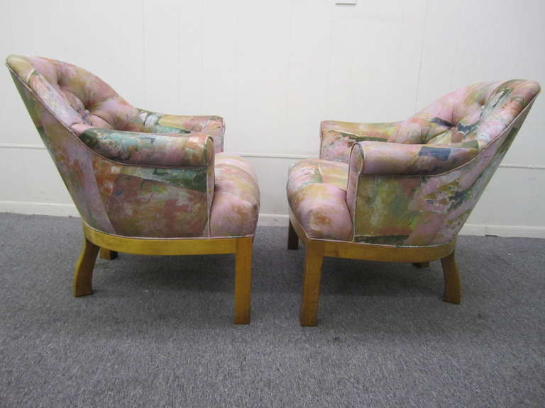 Spectacular Mid-century modern pair of Asian influenced club chair .  The vintage fabric is remarkably gorgeous and has a silk like texture.   I love the thick chunky fruitwood frame with a slight distressed finish.  The back legs are especially