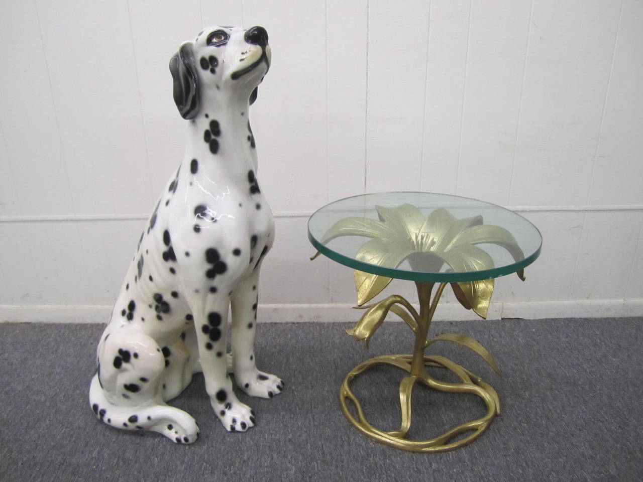 Fabulous and whimsical lifesize capodimonte porcelain sculpture. You will do a double take when you see Mr. Spotty-he looks so real. You will not be able to live with out this fabulous four legged friend-no walks needed.