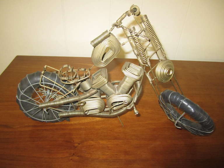 Awesome C Jere style wire sculpture of a motorcycle.  This piece is very well sculpted using bits of wire then painted gold-nice details.  Heres a gift you know he will like and none of his friends will have!