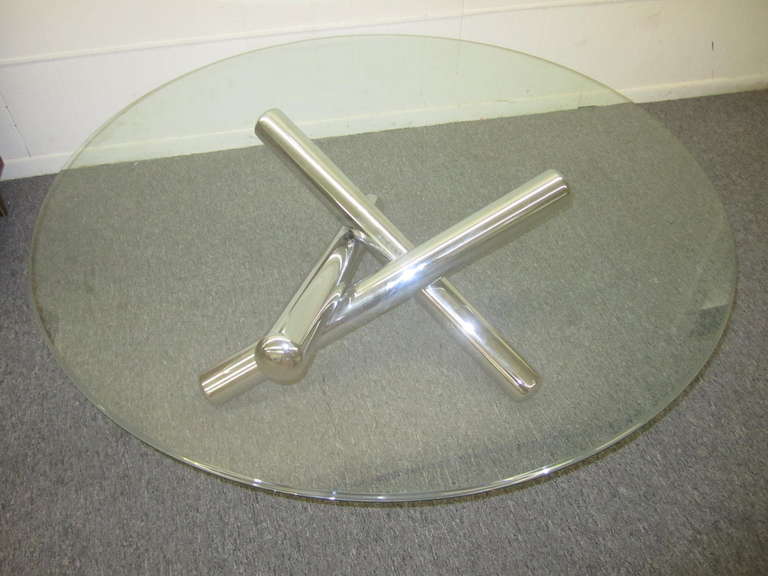 Milo Baughman Jax table with three polished chrome tubes support a round glass top, unsigned, 42