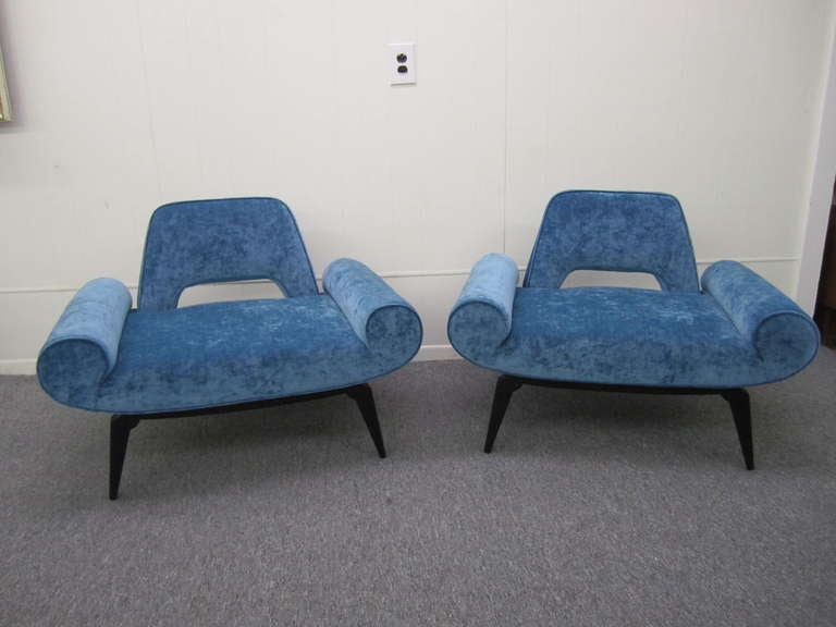 Amazing pair of Grosfeld House slipper chairs. These gorgeous chairs have been totally restored with new high end velvet in a lovely shade of turquoise blue. All of the foam and springs have been replaced along with a fresh coat of satin black on