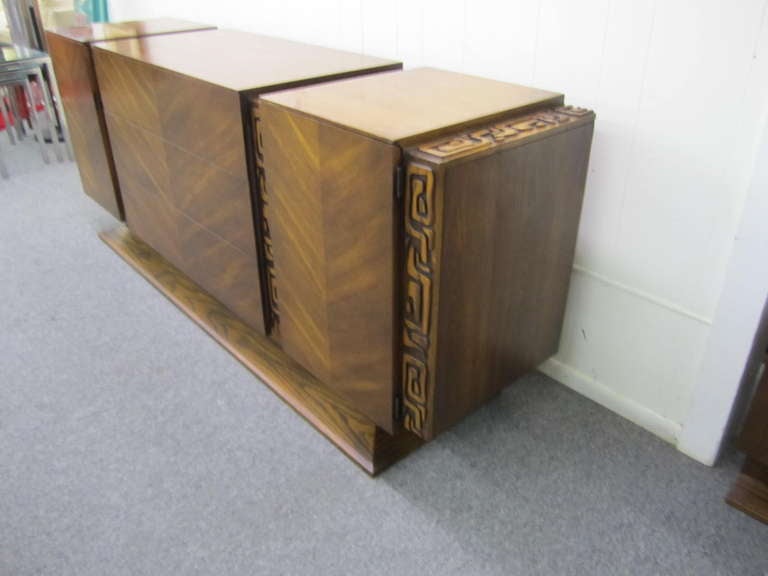 Fabulous sculptural walnut brutalist credenza made by United furniture company.  This piece is very impressive in person with the well sculpted bands in a brutalist style.  Tons of storage with even more style.  I have other pieces from this