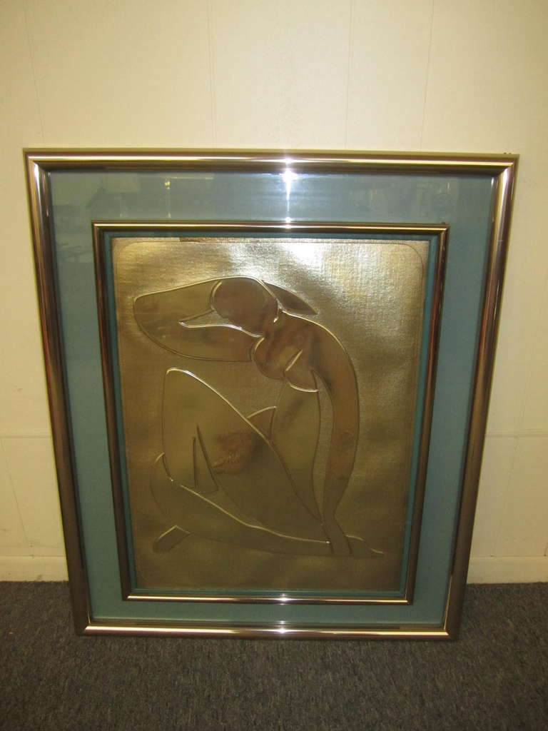 Lovely Matisse inspired metallic gold embossed wall hanging. Large embossed image on a textured gold paper-well framed.