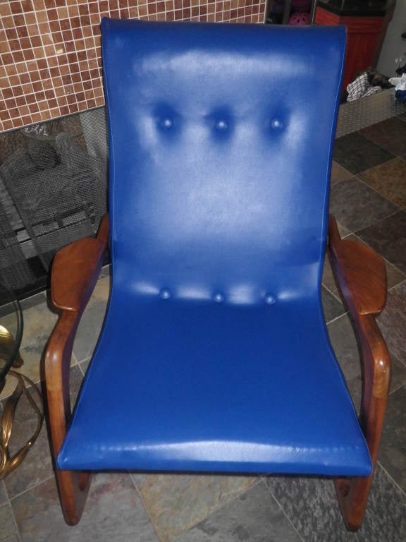 GORGEOUS ADRIAN PEARSALL CRAFT ASSOCIATES SCULPTURAL WALNUT ROCKER.  THIS PIECE IS IN GREAT VINTAGE CONDITION WITH IT'S ORIGINAL BLUE VINYL FABRIC.  IT HAS A WONDERFUL SCULPTURAL QUALITY AND IS AMAZING IN PERSON.