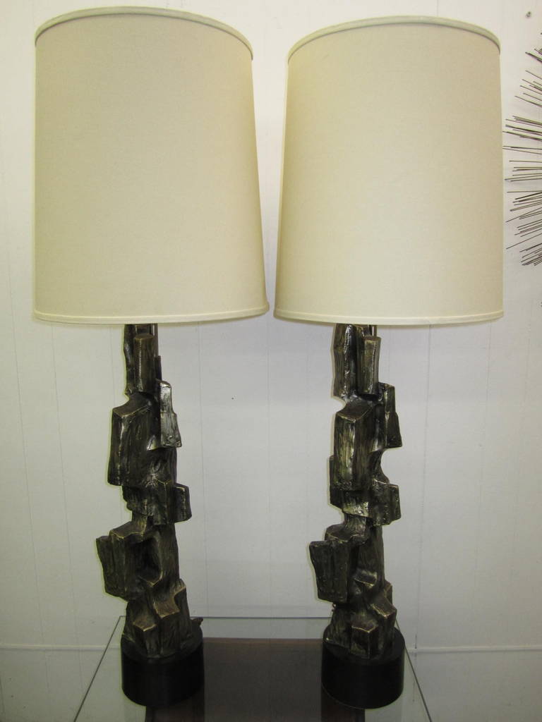 Pair of large-scale, Brutalist table lamps. These are what I like to call the Holy Grail of Laurel Lamps. These amazing lamps command attention in any setting. Try putting a jeweled tone purple drum shade on them- exquisite!