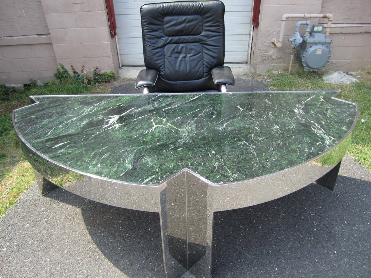 A vintage 1970s large 'Mezzaluna' desk designed by Leon Rosen for Pace Collection. Half-circle desk with a wide chromed steel frame and verde green marble-top. Magnificent in person this desk is sure to impress! We do have the matching rolling desk